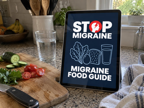 Migraine Food Guide PDF on a tablet in a kitchen